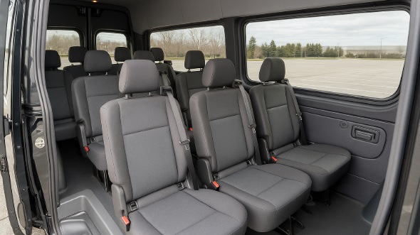 bloomington sprinter van with driver inside